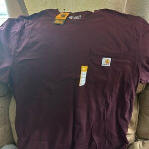 Carhart loose fit t-shirt. Brand new still tags. Chest pocket.